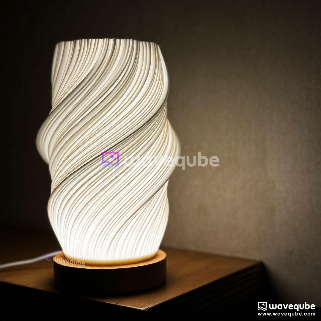 Waveqube Horizon Lamp 3D printed with wave textured surface with concrete background